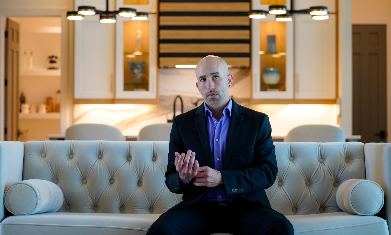 Shawn Jurgrau seated in a bright home